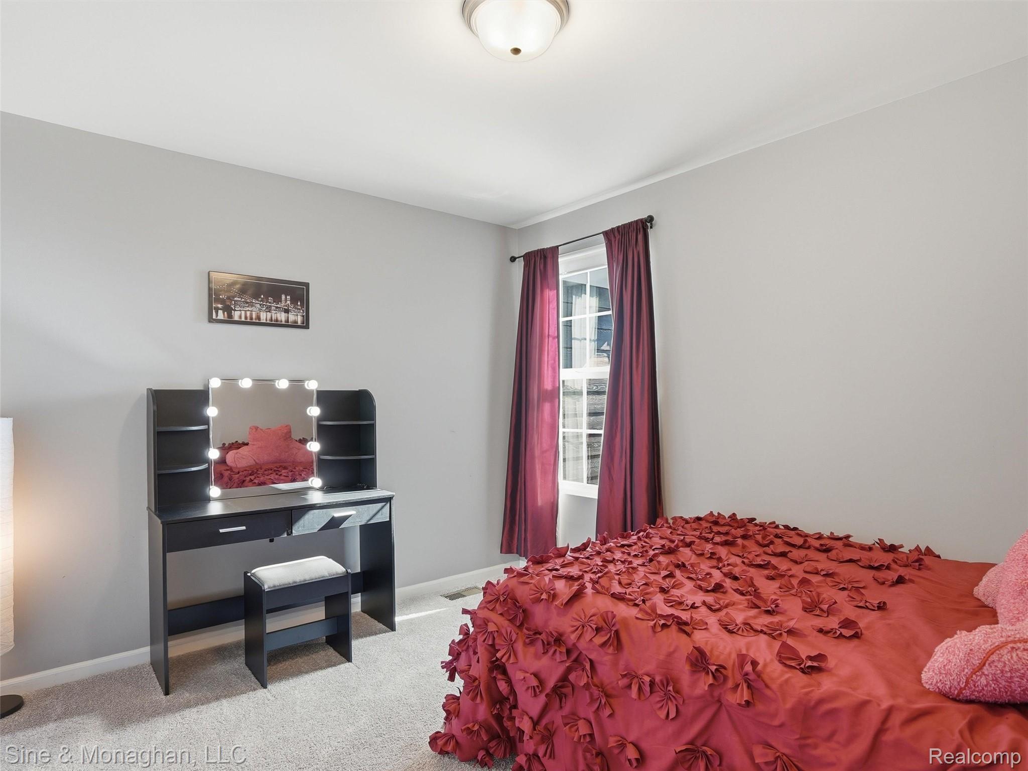 24827 Ivy Road Novi, MI 48375 - Photo 21 of 38 Bedroom featuring light gray walls and carpeted flooring