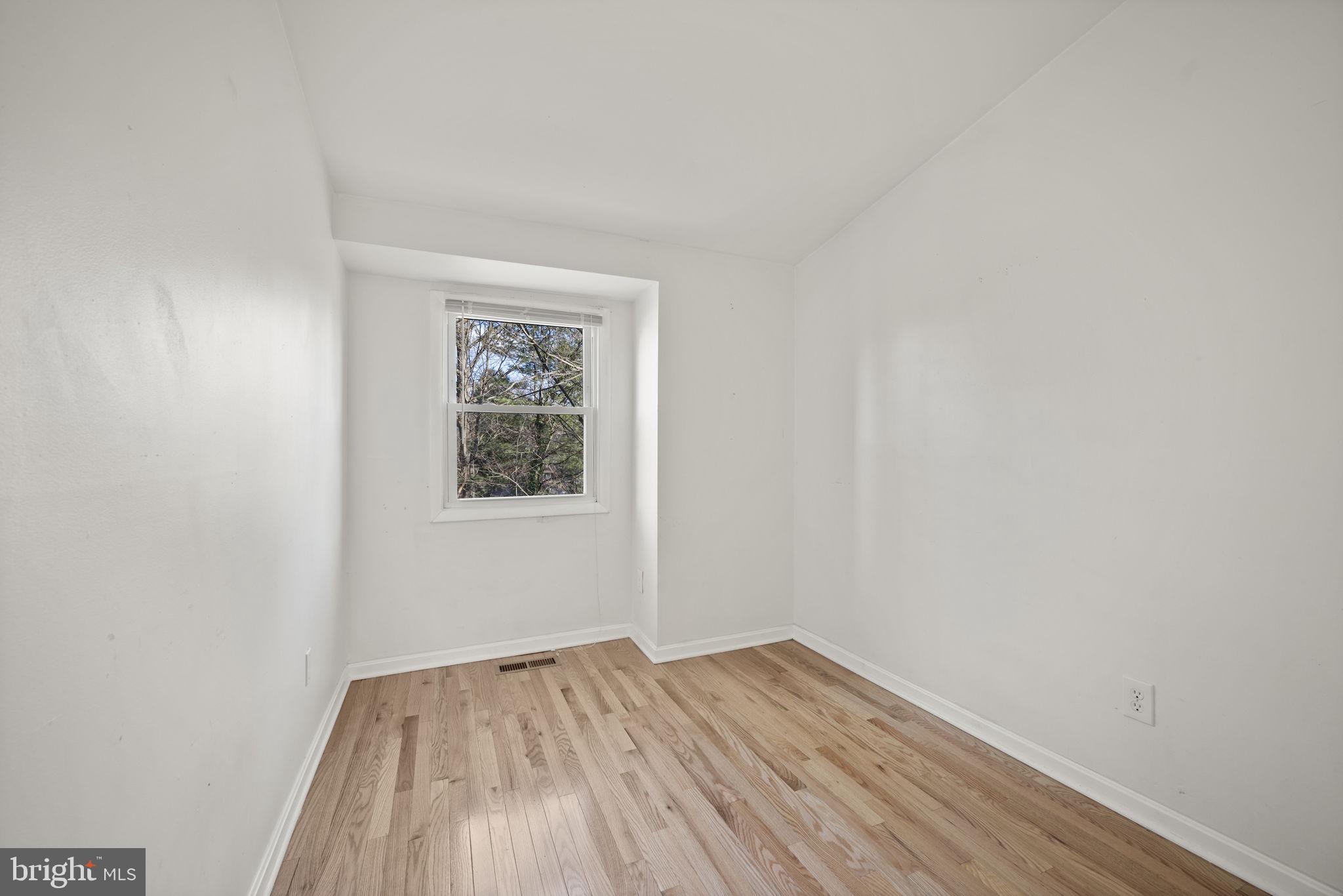 5451 Endicott Lane Columbia, MD 21044 - Photo 15 of 28 a view of a room with wooden floor and window