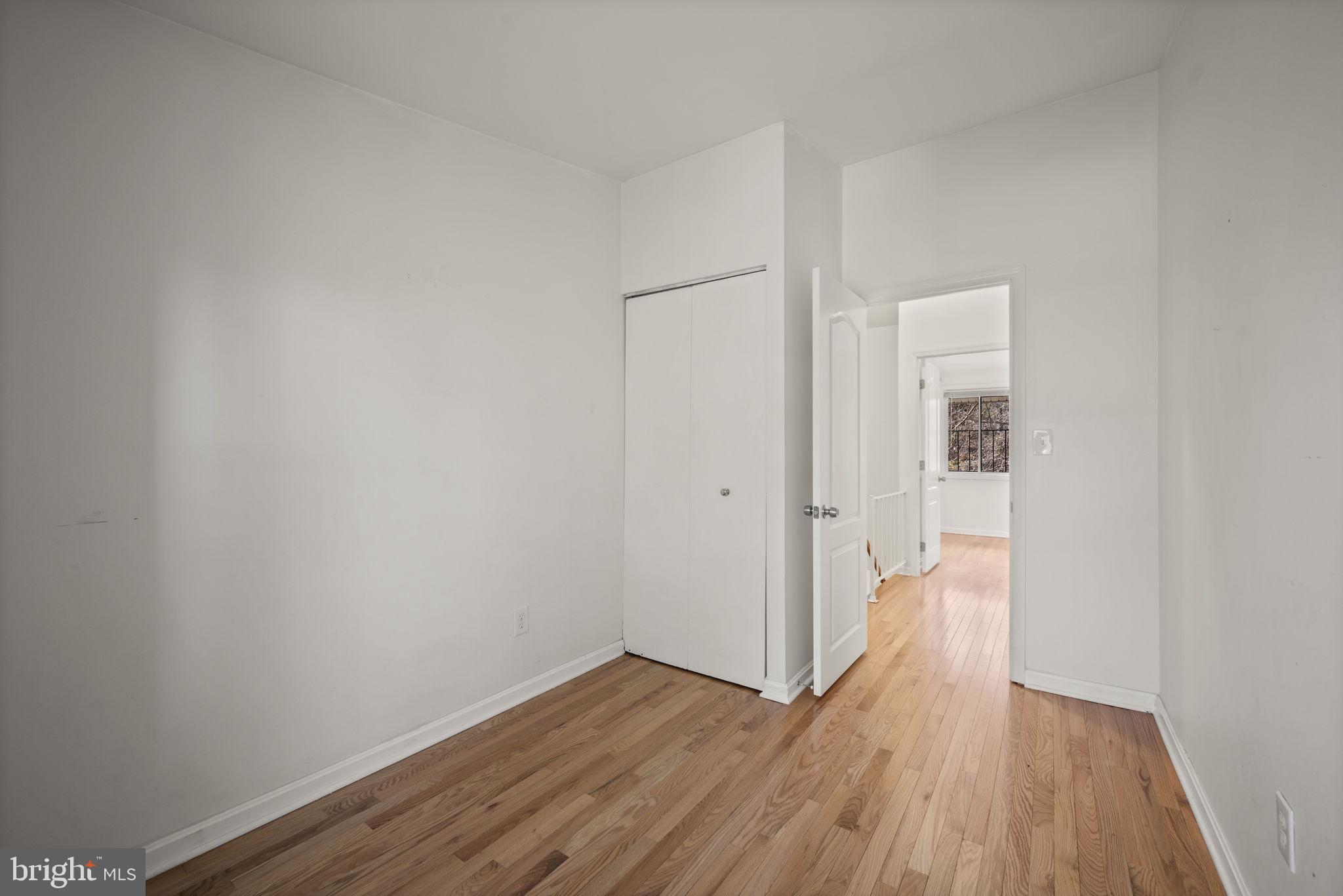 5451 Endicott Lane Columbia, MD 21044 - Photo 16 of 28 a view of a room with wooden floor