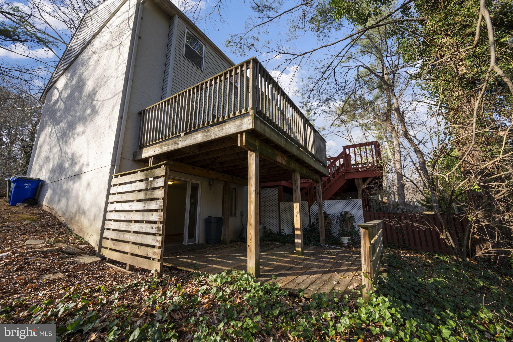 5451 Endicott Lane Columbia, MD 21044 - Photo 28 of 28 a view of a house with a stairs and wooden fence