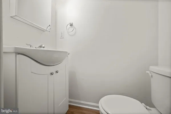 a bathroom with a toilet and a sink