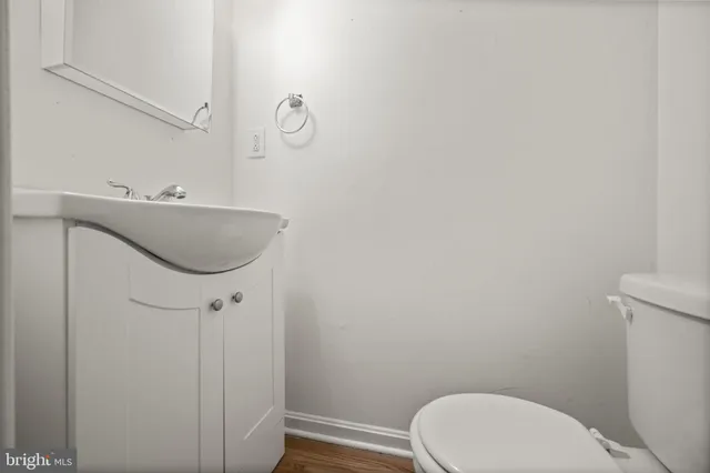 a bathroom with a toilet and a sink