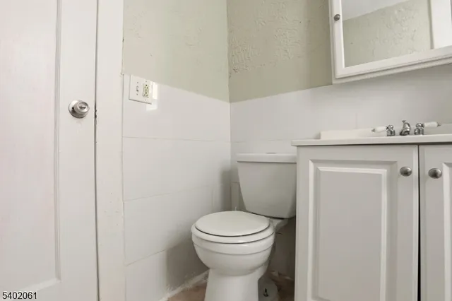 a kitchen with a stove microwave and sink