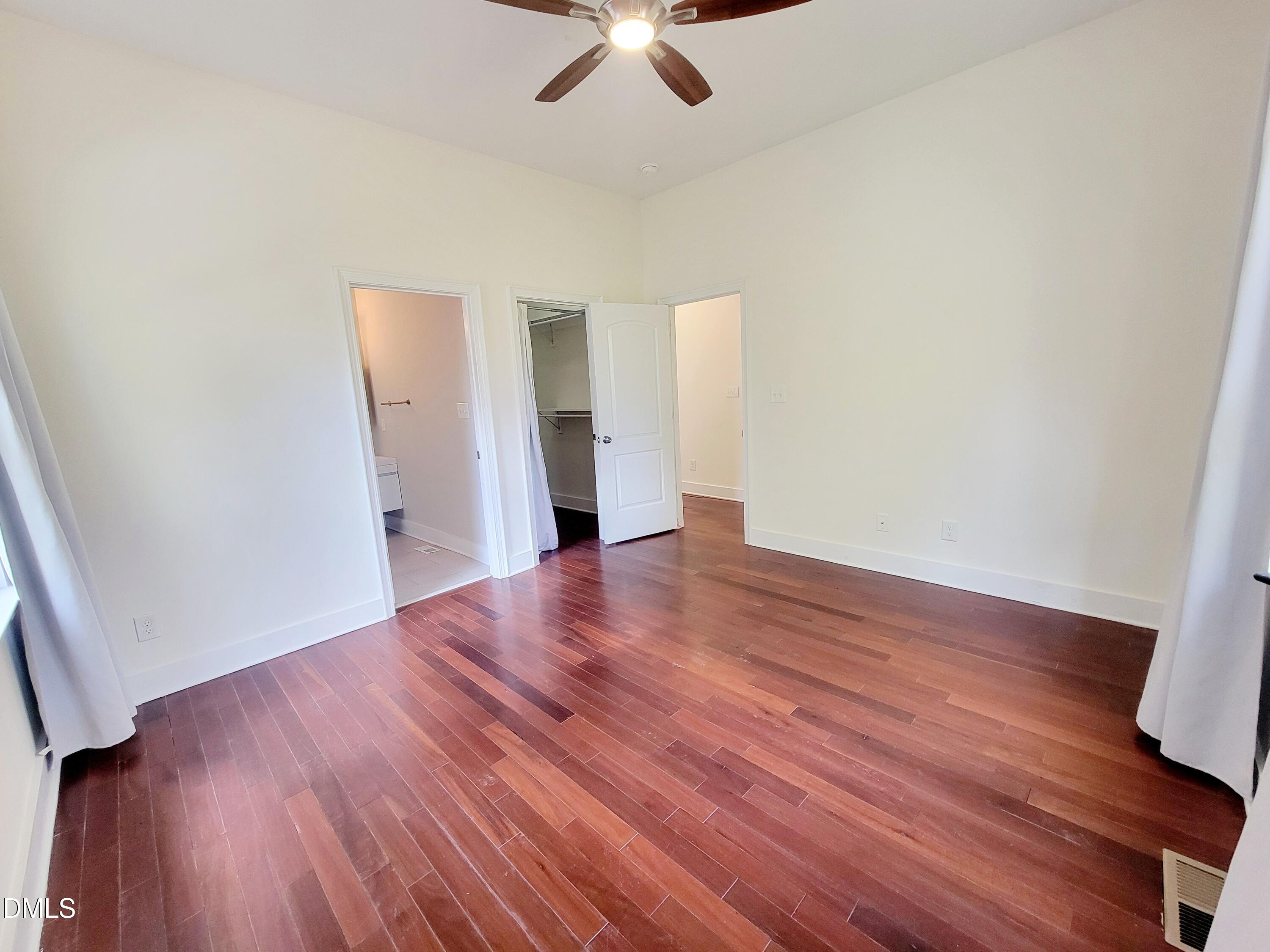 707 South East Street Raleigh, NC 27601 - Photo 16 of 46 a view of empty room with wooden floor
