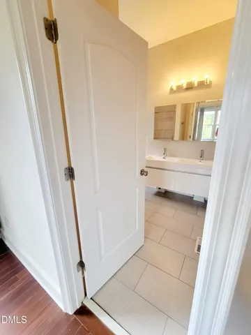 a bathroom with a tub and shower