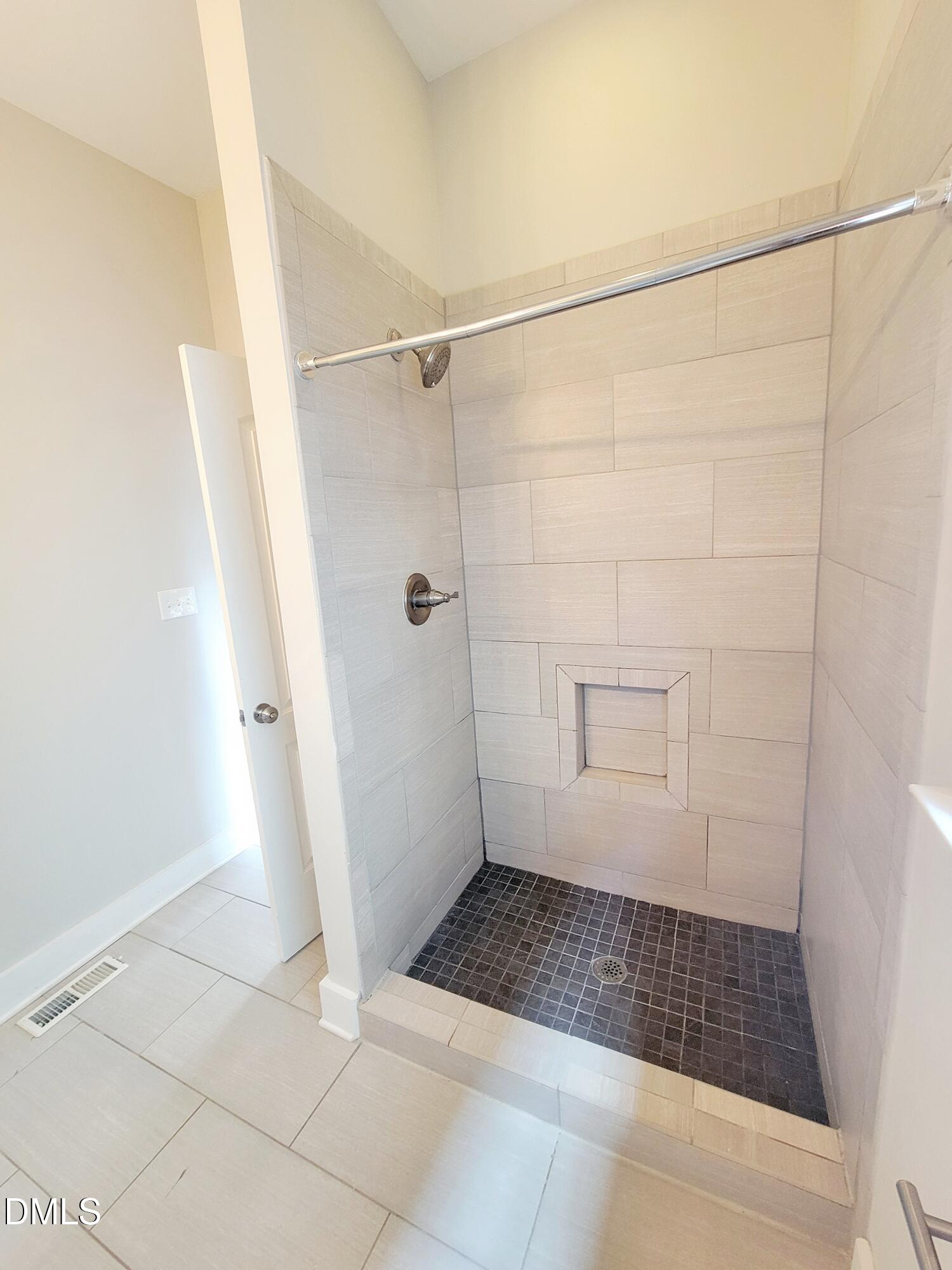 707 South East Street Raleigh, NC 27601 - Photo 22 of 46 a bathroom with a shower