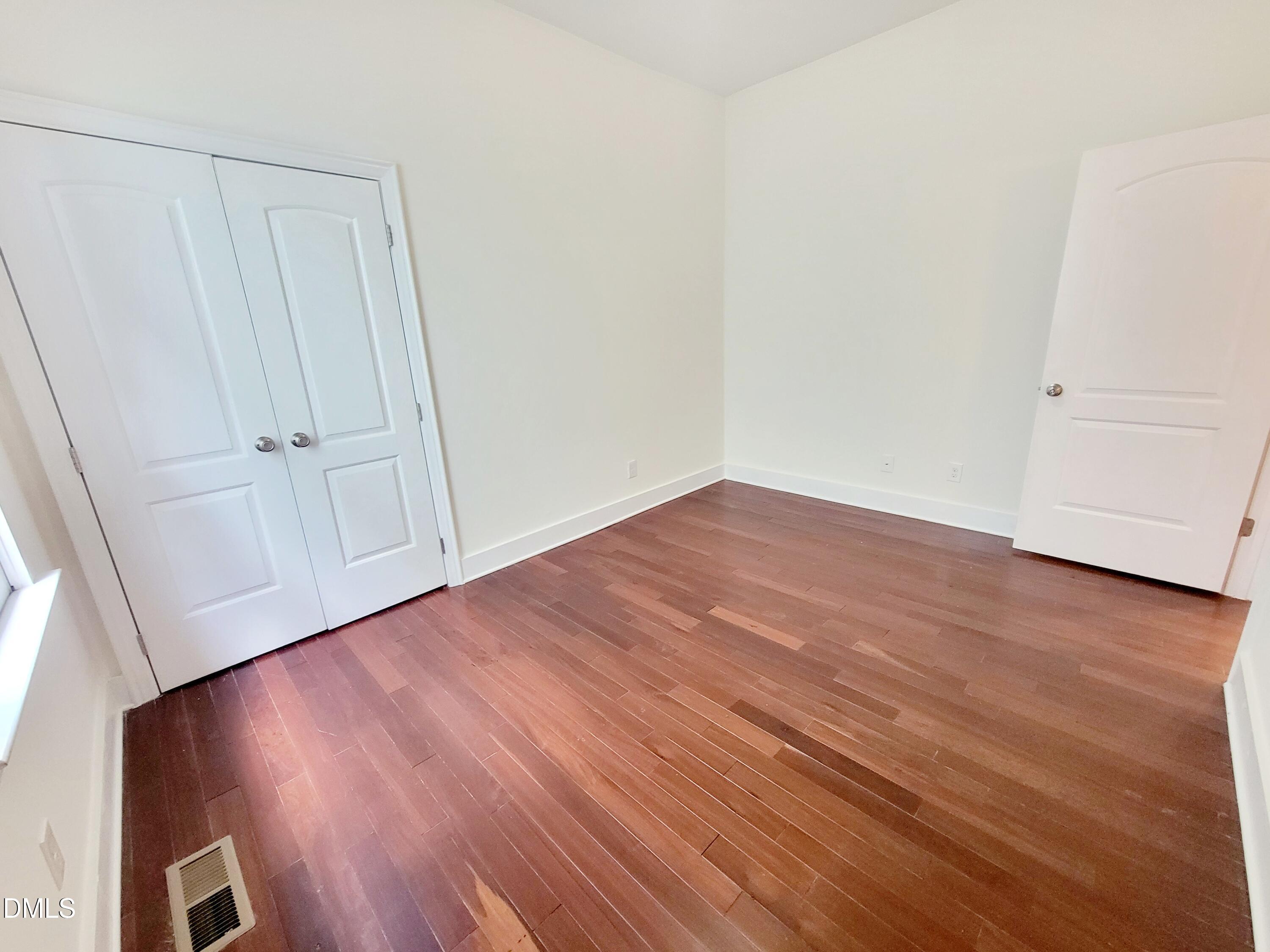 707 South East Street Raleigh, NC 27601 - Photo 32 of 46 a view of a room with wooden floor