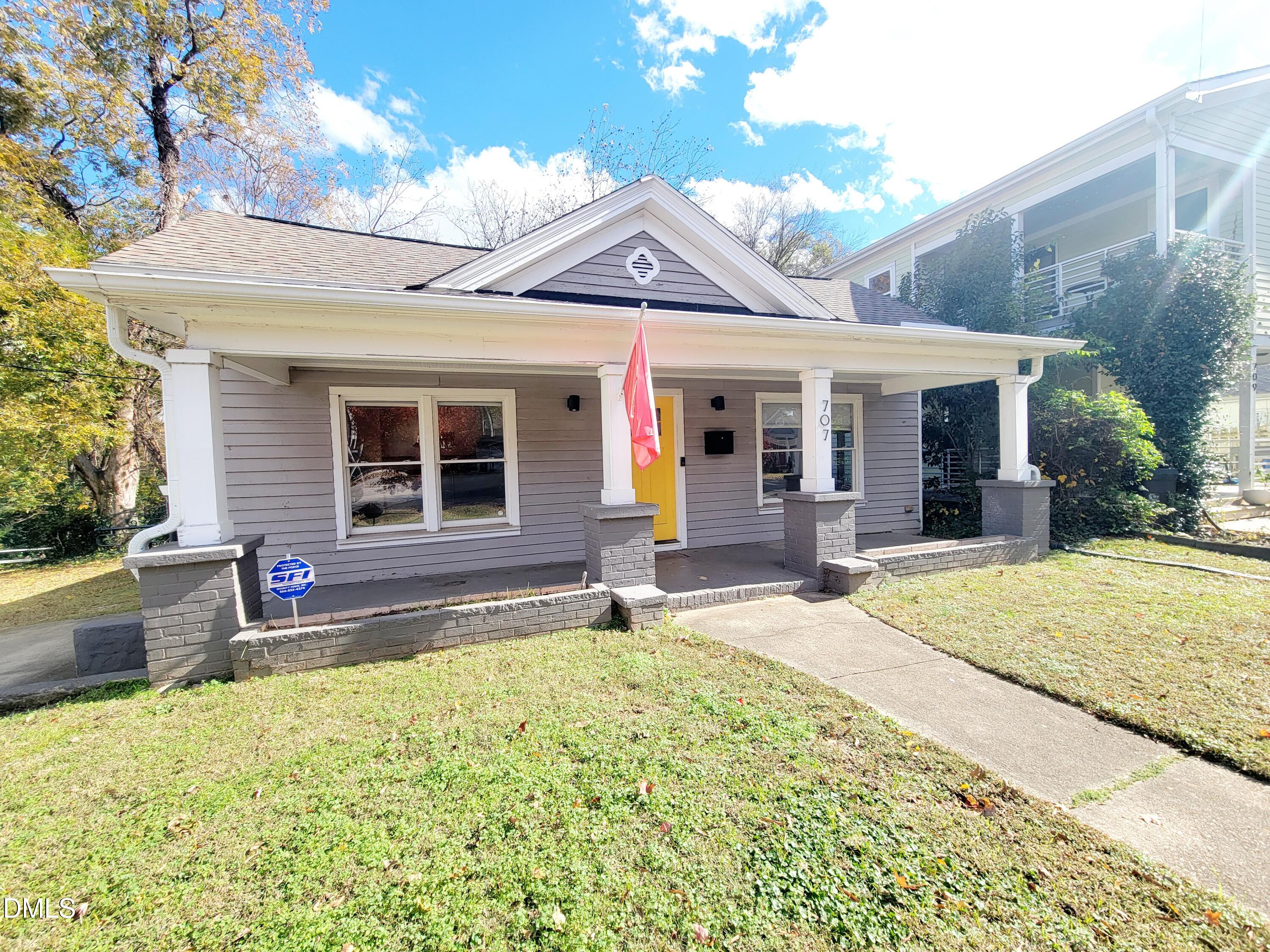707 South East Street Raleigh, NC 27601 - Photo 43 of 46 a front view of a house with a garden and patio