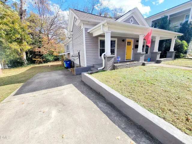 a view of a house with snow on the wall