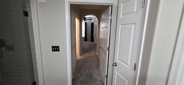 a view of entryway with wooden floor