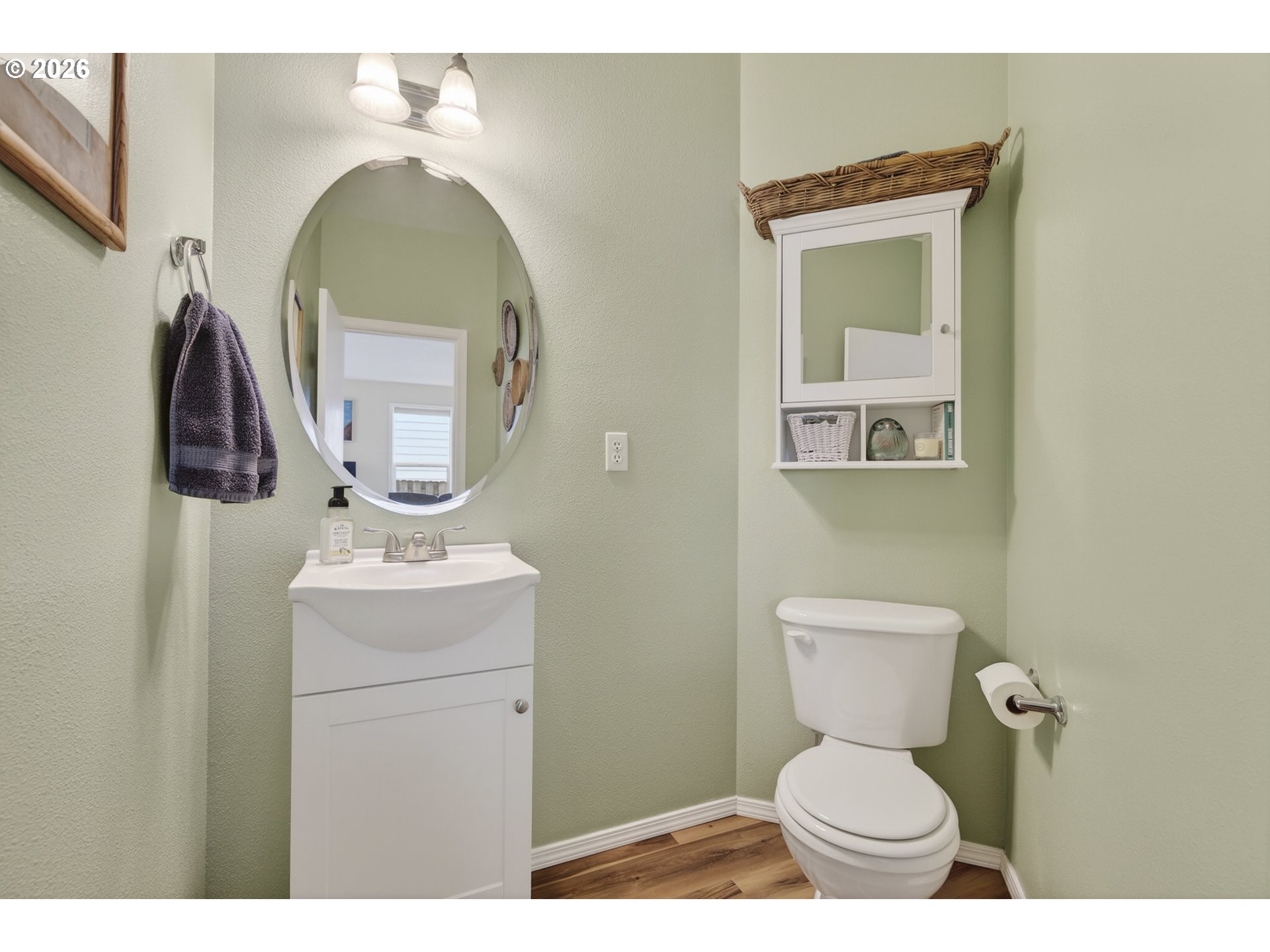 163 Southwest Sandlewood Loop Gresham, OR 97030 - Photo 35 of 47 a bathroom with a toilet sink and mirror