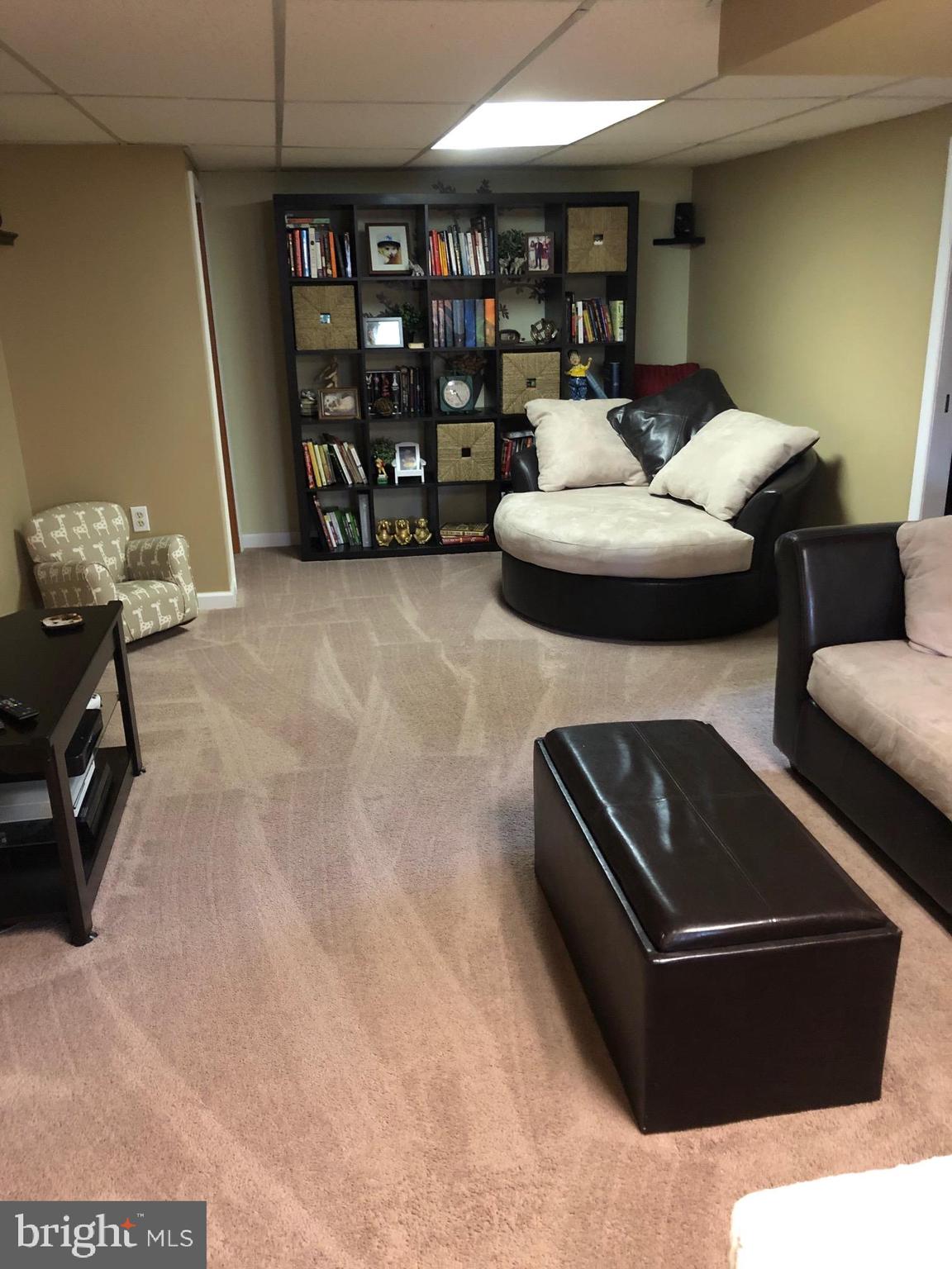 1411 Blackrock Road Swarthmore, PA 19081 - Photo 20 of 34 Family Room with Neutral Carpeting