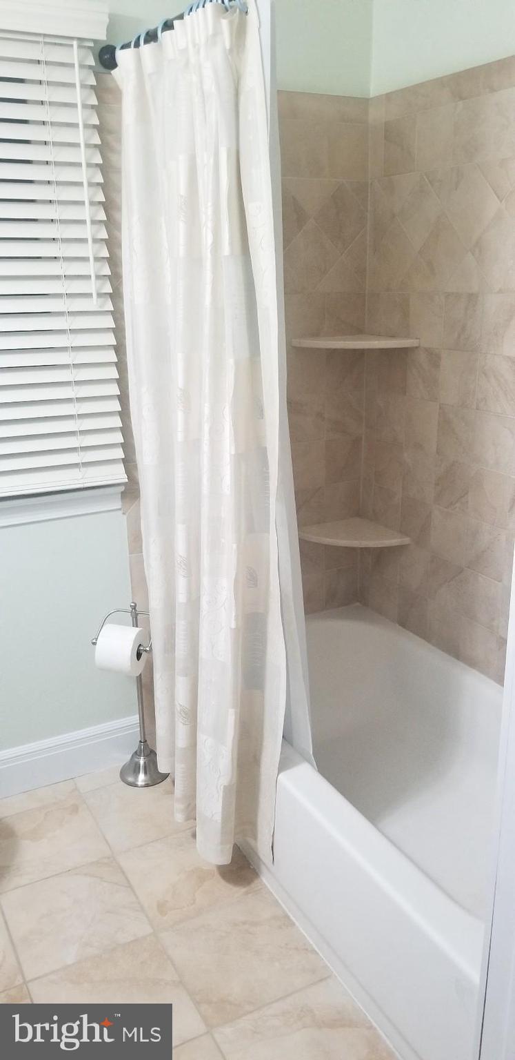 1411 Blackrock Road Swarthmore, PA 19081 - Photo 23 of 34 Remodeled ceramic tile tub/bath