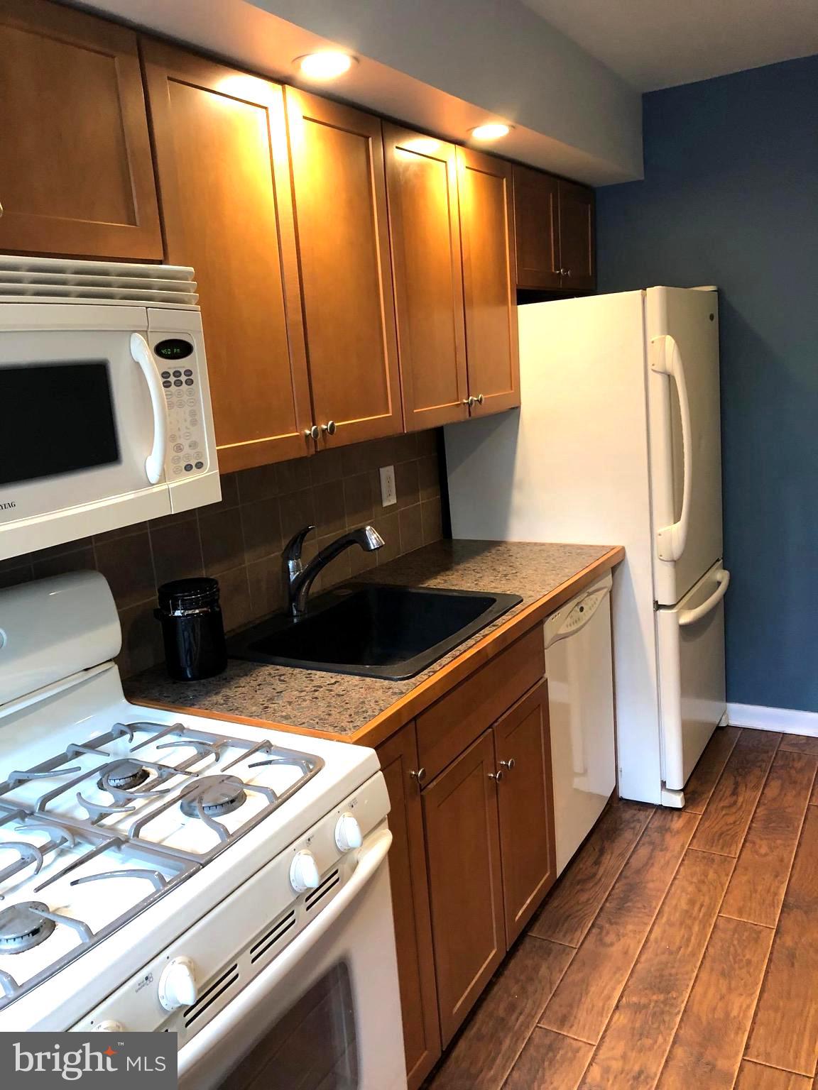 1411 Blackrock Road Swarthmore, PA 19081 - Photo 10 of 34 Updated and efficient kitchen w/gas cooking
