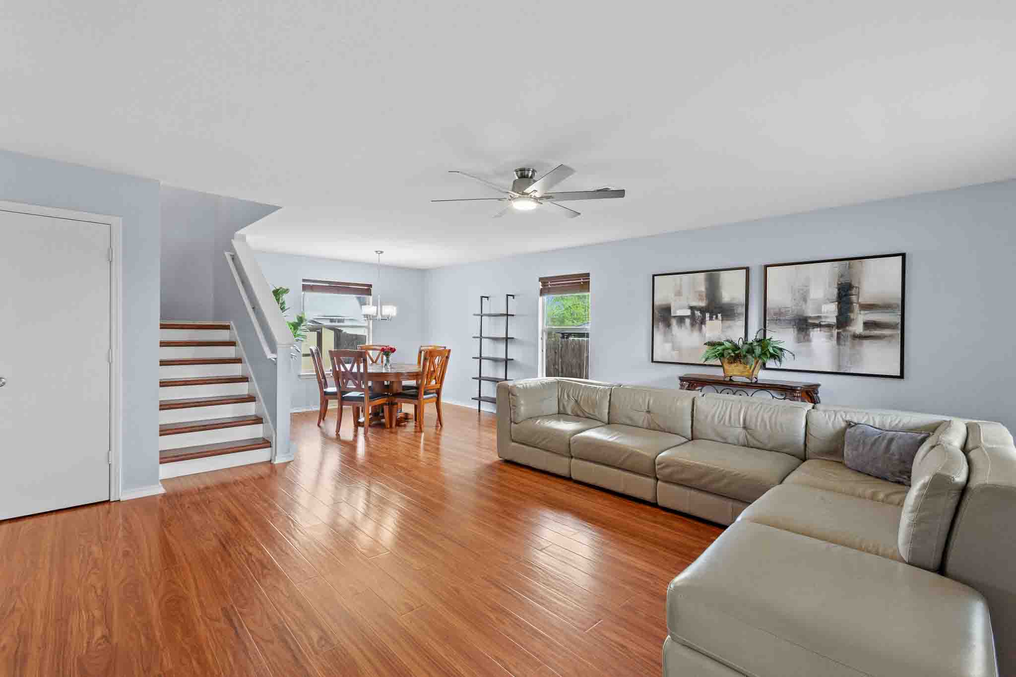 270 Endeavour Kyle, TX 78640 - Photo 4 of 20 Spacious living area featuring polished wood flooring and light blue walls