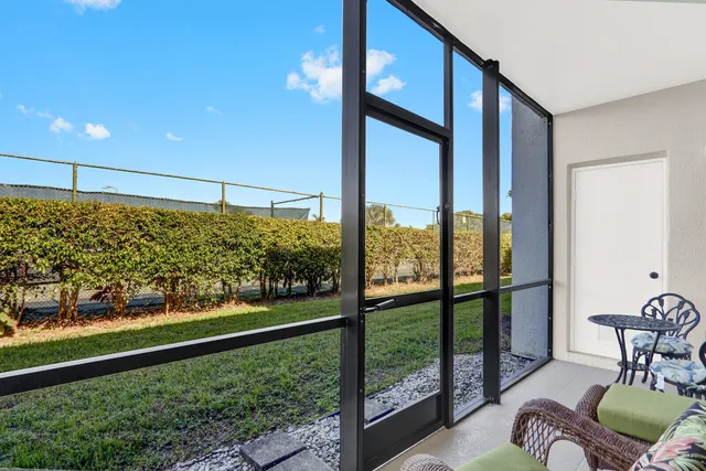 a view of a porch with furniture
