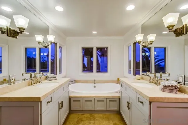 a bedroom with a bed and a table