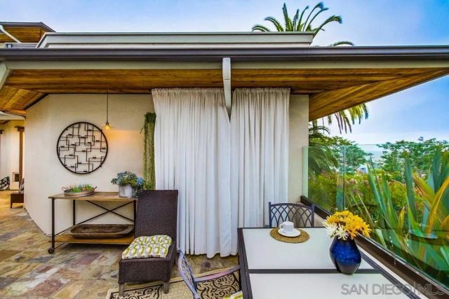 a view of a chairs and table in a room
