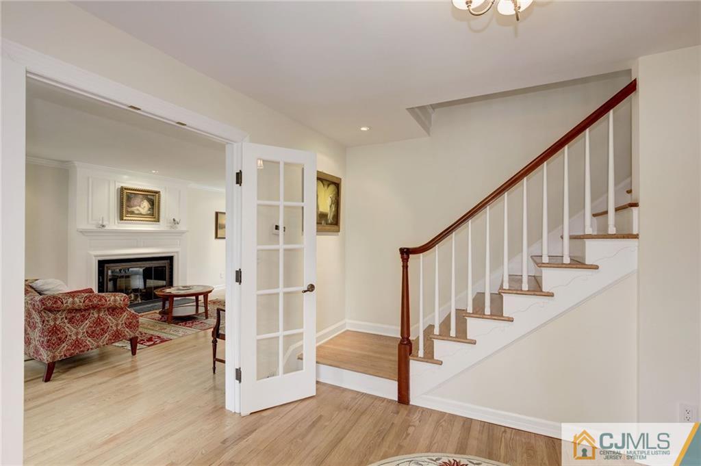 105 Elm Road Princeton, NJ 08540 - Photo 2 of 25 a view of front door with dining room and stairs