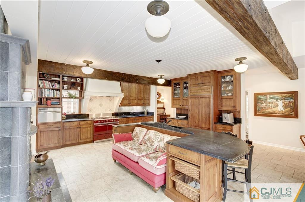 105 Elm Road Princeton, NJ 08540 - Photo 12 of 25 a kitchen with a stove a refrigerator and couches