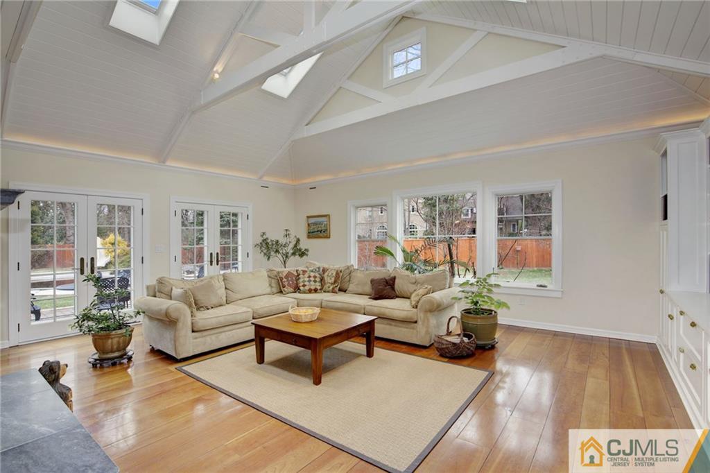 105 Elm Road Princeton, NJ 08540 - Photo 13 of 25 a living room with furniture and a wooden floor