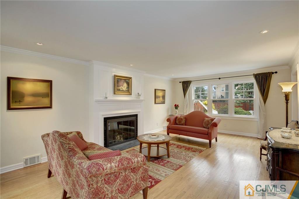 105 Elm Road Princeton, NJ 08540 - Photo 4 of 25 a living room with furniture and a fireplace