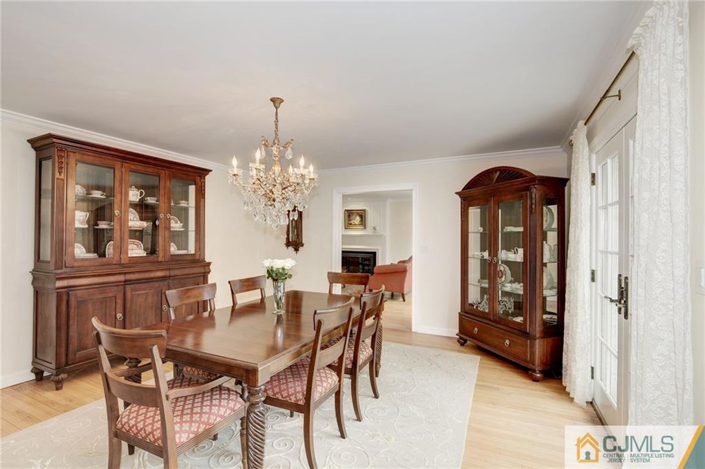105 Elm Road Princeton, NJ 08540 - Photo 5 of 25 a view of a dining room with furniture and chandelier