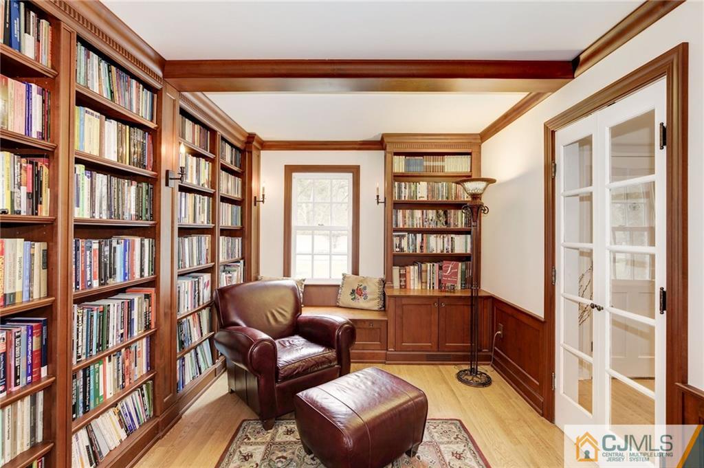 105 Elm Road Princeton, NJ 08540 - Photo 6 of 25 a living room with furniture and a book shelf