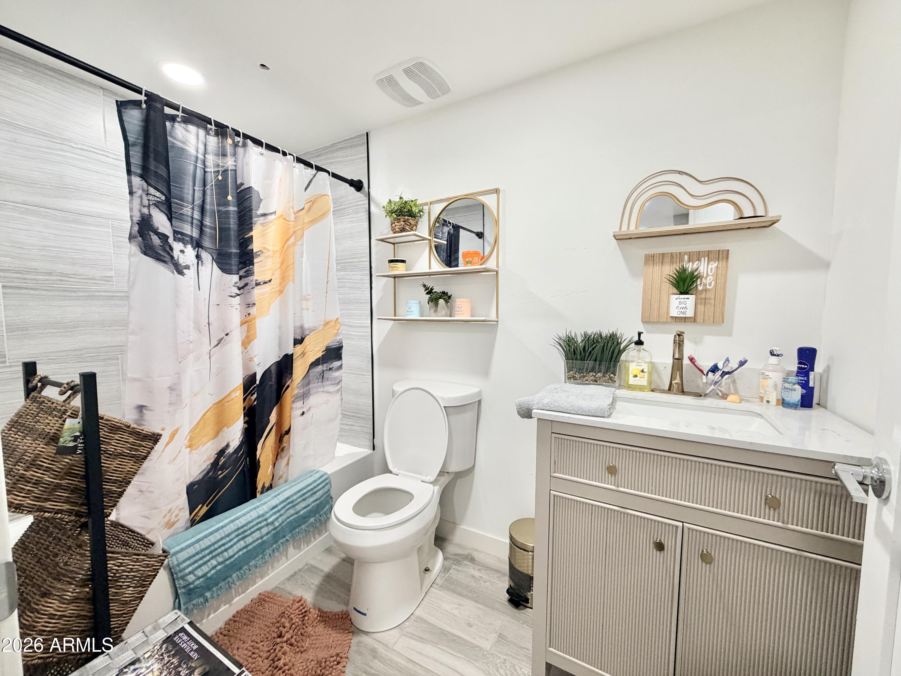 1925 Rock Castle Drive Prescott, AZ 86305 - Photo 6 of 25 a bathroom with a toilet sink and mirror