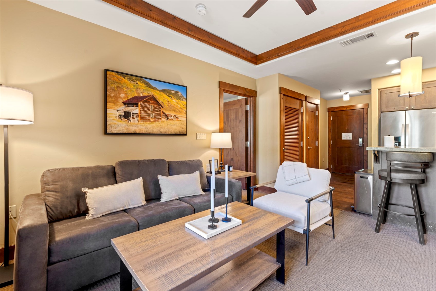 1521 Ski Hill Road, Unit 8313 Breckenridge, CO 80424 - Photo 11 of 45 a living room with furniture and a table