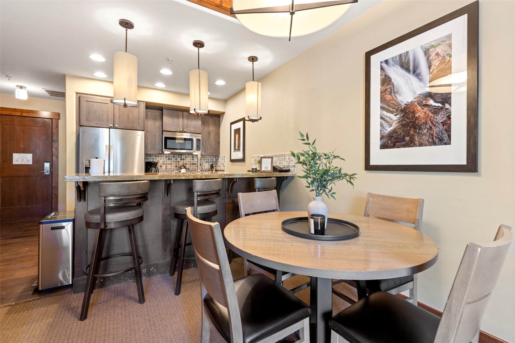 1521 Ski Hill Road, Unit 8313 Breckenridge, CO 80424 - Photo 13 of 45 a dining room with furniture and window