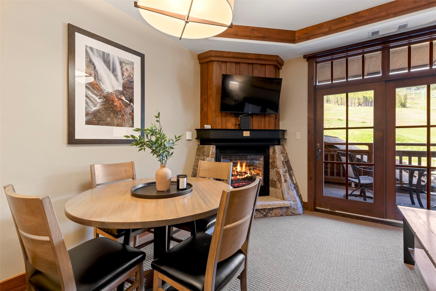 1521 Ski Hill Road, Unit 8313 Breckenridge, CO 80424 - Photo 18 of 45 a dining room with furniture and window