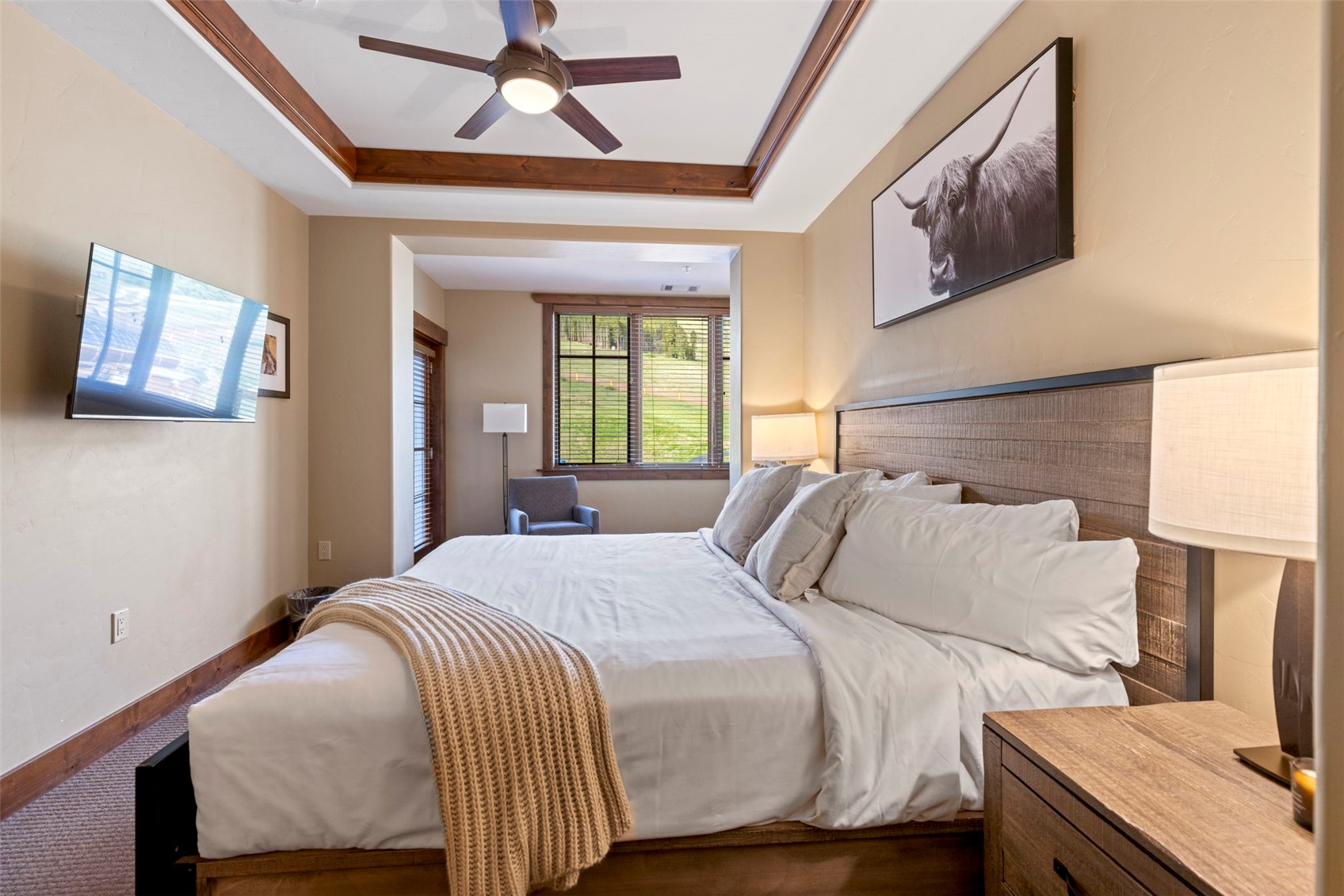 1521 Ski Hill Road, Unit 8313 Breckenridge, CO 80424 - Photo 24 of 45 a bedroom with a bed and window