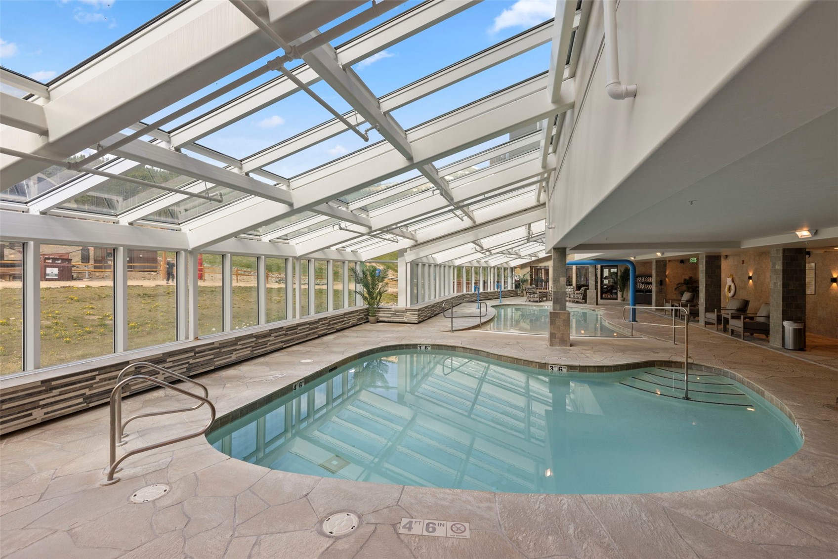 1521 Ski Hill Road, Unit 8313 Breckenridge, CO 80424 - Photo 31 of 45 a view of a living room with kitchen area