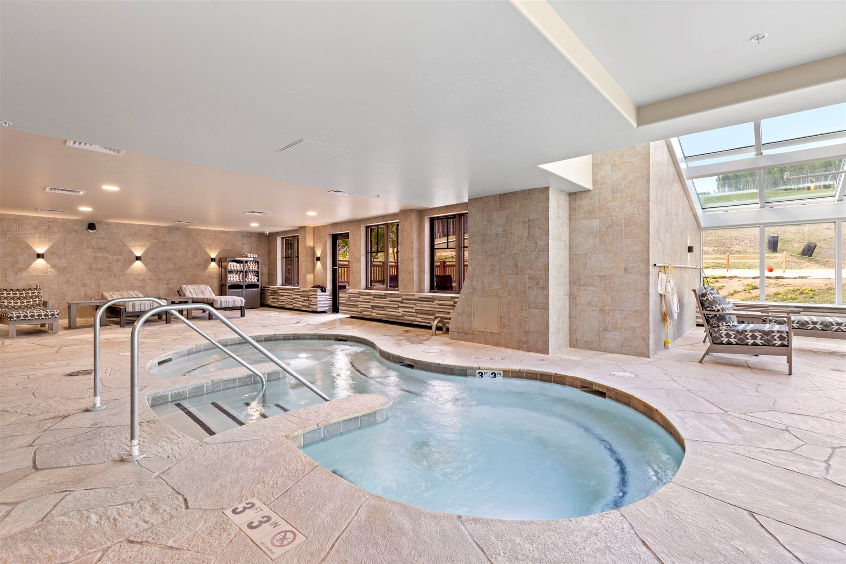 1521 Ski Hill Road, Unit 8313 Breckenridge, CO 80424 - Photo 32 of 45 a view of a living room and kitchen