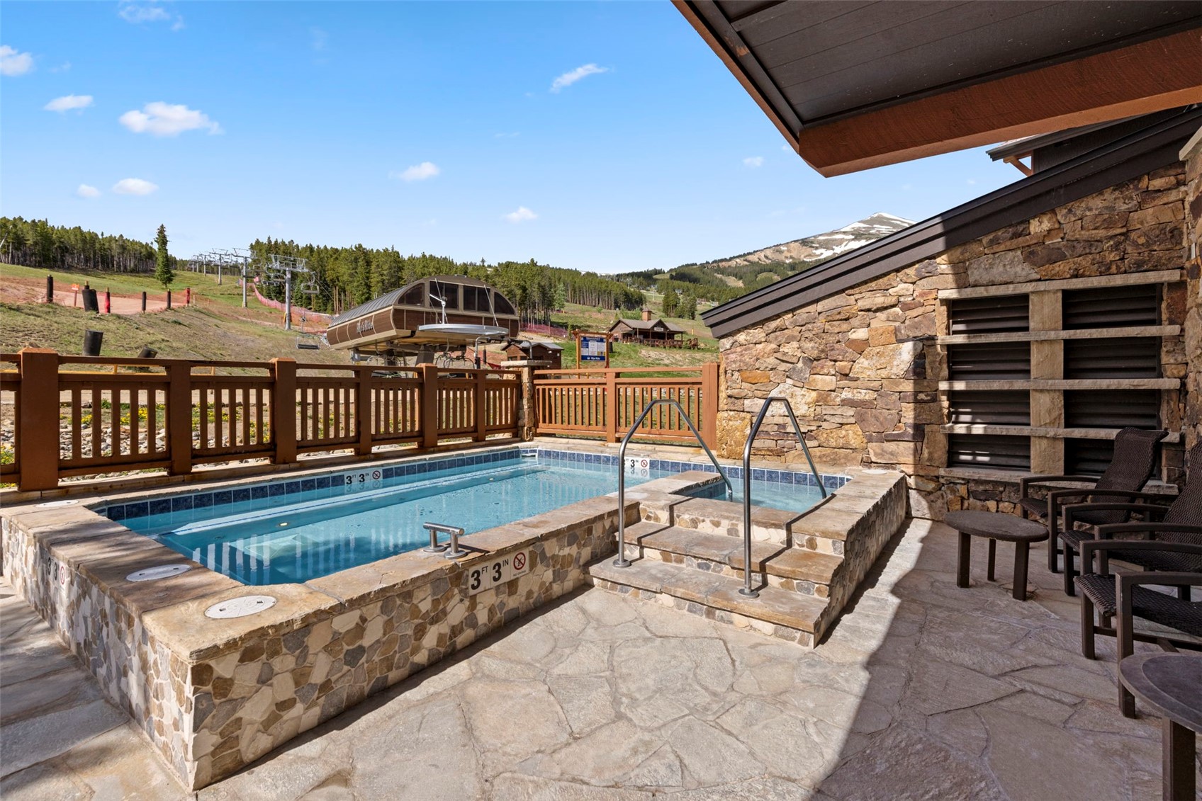 1521 Ski Hill Road, Unit 8313 Breckenridge, CO 80424 - Photo 35 of 45 a view of a balcony with chairs