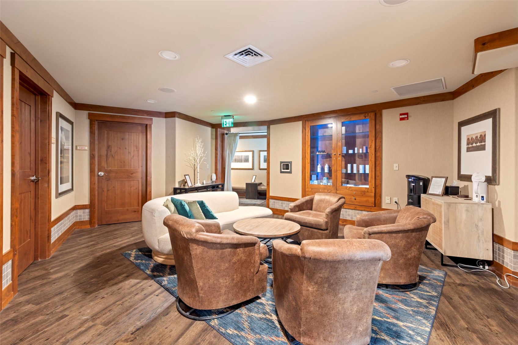 1521 Ski Hill Road, Unit 8313 Breckenridge, CO 80424 - Photo 37 of 45 a living room with fireplace furniture and a wooden floor