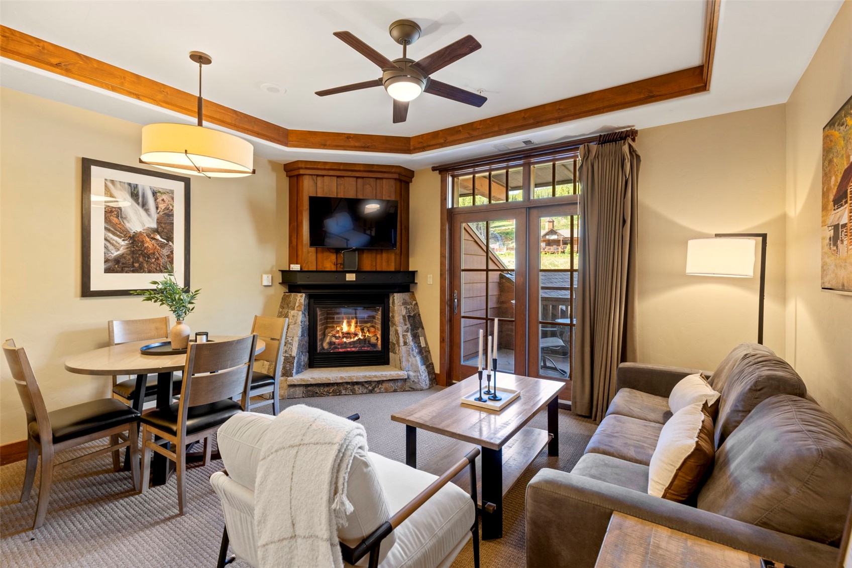 1521 Ski Hill Road, Unit 8313 Breckenridge, CO 80424 - Photo 9 of 45 a living room with furniture a flat screen tv and a window