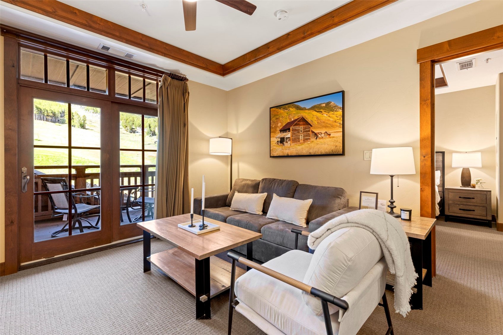 1521 Ski Hill Road, Unit 8313 Breckenridge, CO 80424 - Photo 10 of 45 a living room with furniture and a large window