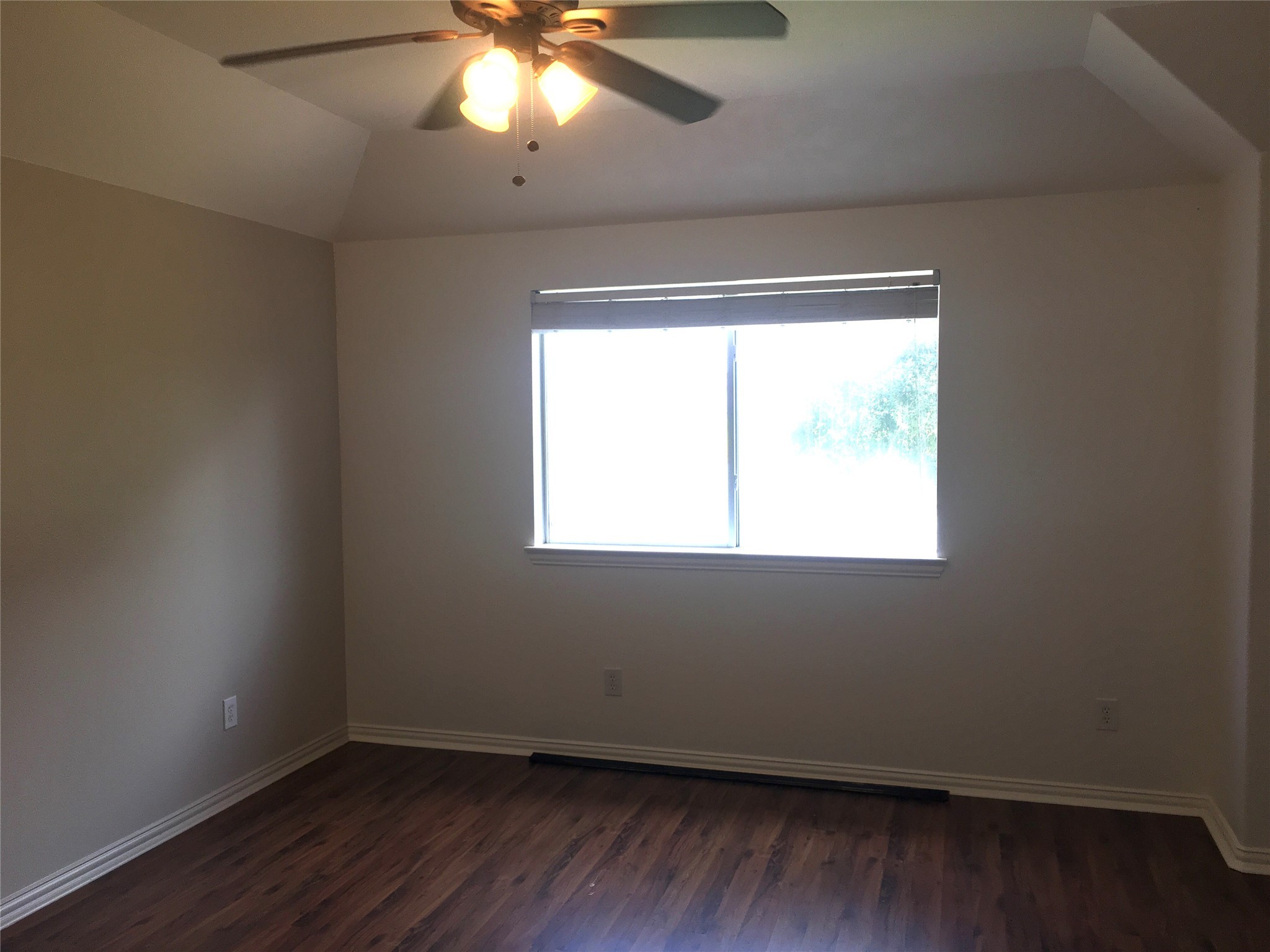 10730 Sea Myrtle Drive Houston, TX 77095 - Photo 35 of 36 an empty room with wooden floor and windows