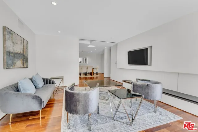 a kitchen with stainless steel appliances a stove sink and cabinets
