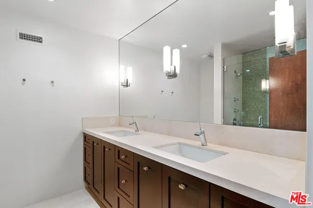 a view of balcony with wooden floor and seating space