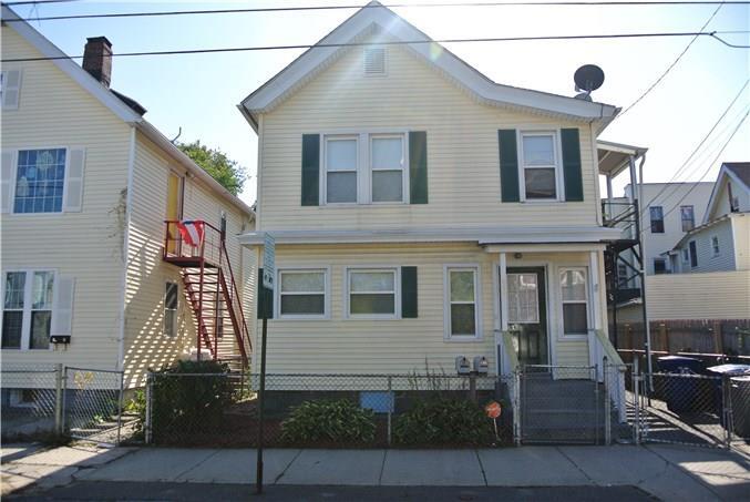 658 Ogden Street Bridgeport, CT 06608 - Photo 1 of 1 a front view of a house
