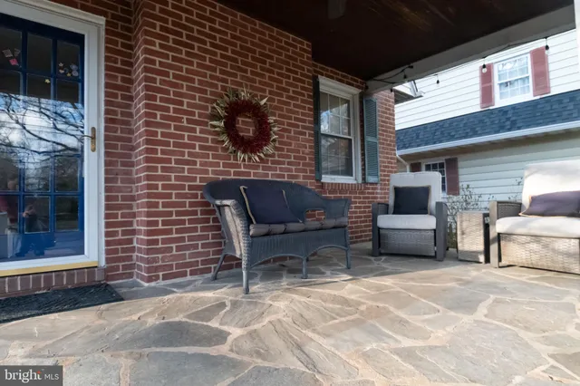 a building outdoor space with patio furniture