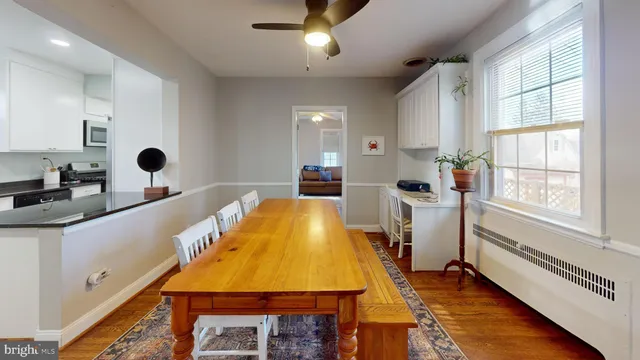 a bedroom with a bed and a table in it