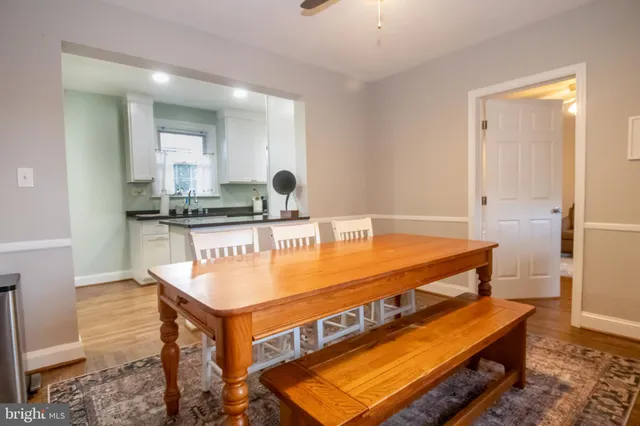 a room with table and chairs