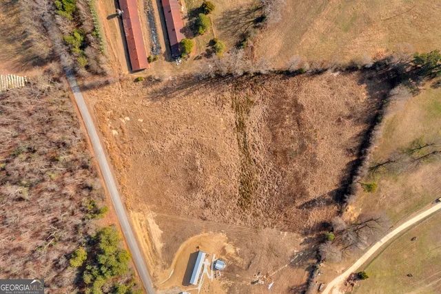 a view of a street with an ocean view
