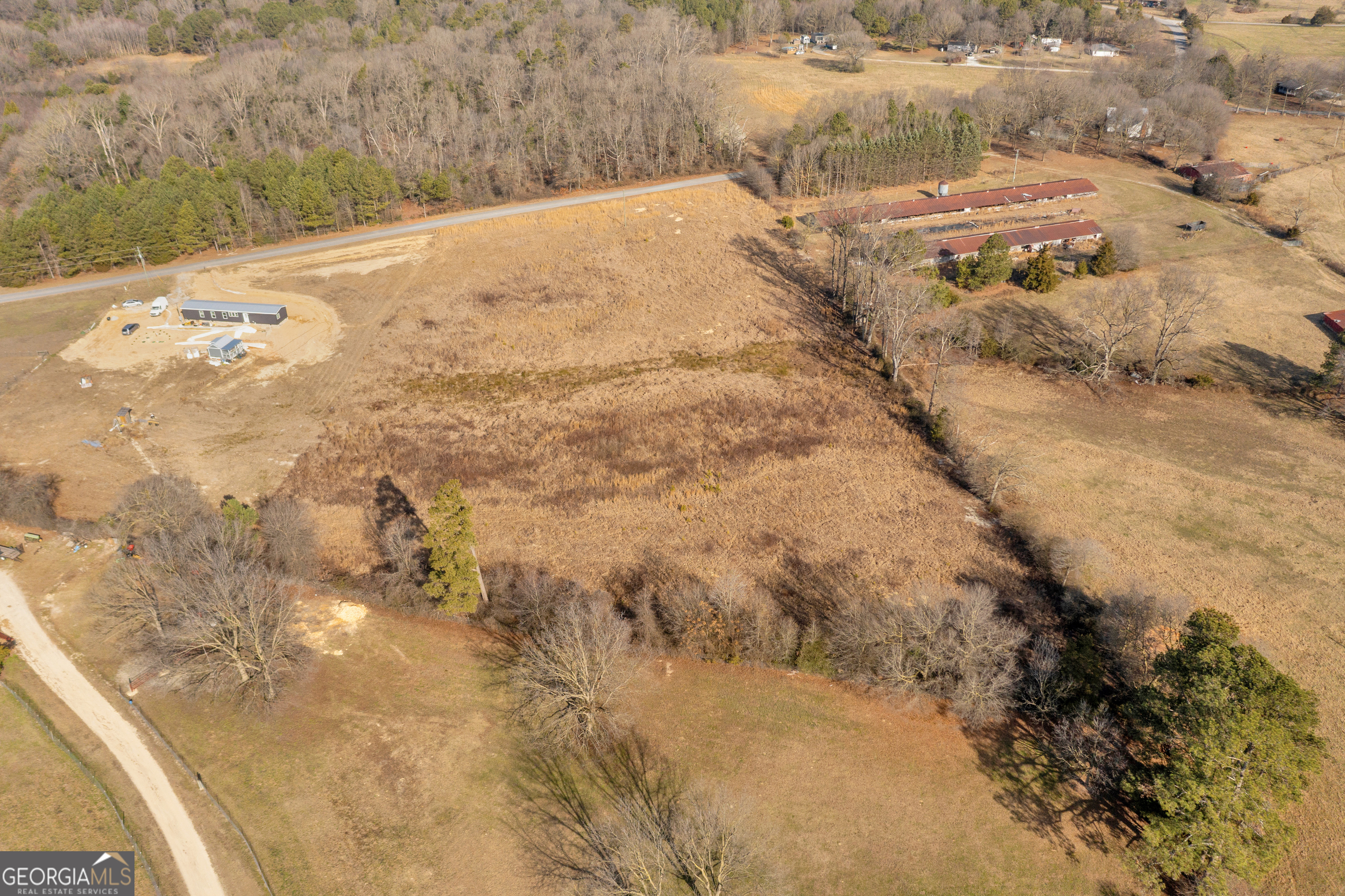 159 Alexander Ray Road Canon, GA 30520 - Photo 19 of 27 a view of a dry yard with trees