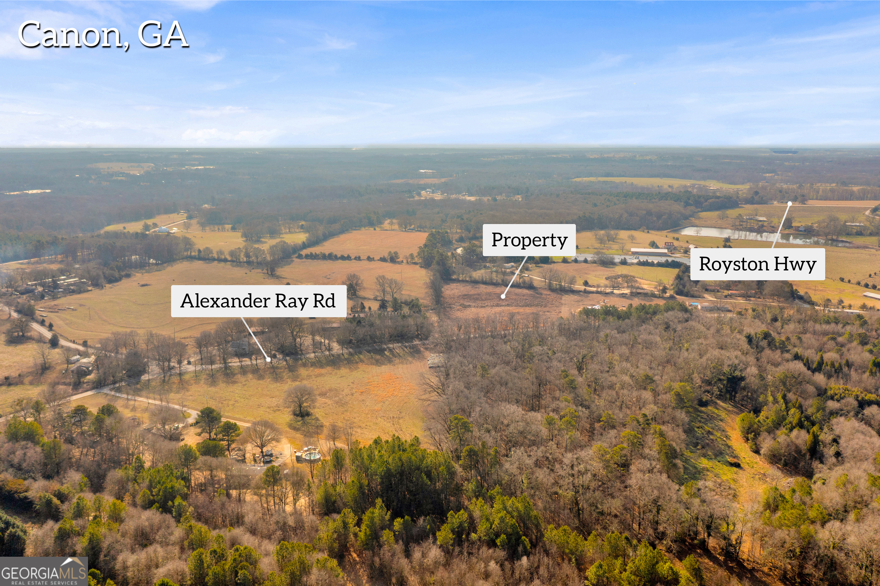 159 Alexander Ray Road Canon, GA 30520 - Photo 4 of 27 a view of a ocean with a building in the background