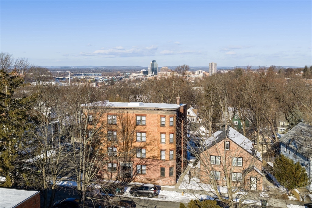 92 Woodside Terrace, Unit 2R Springfield, MA 01108 - Photo 37 of 42 a view of a city with tall buildings in the background